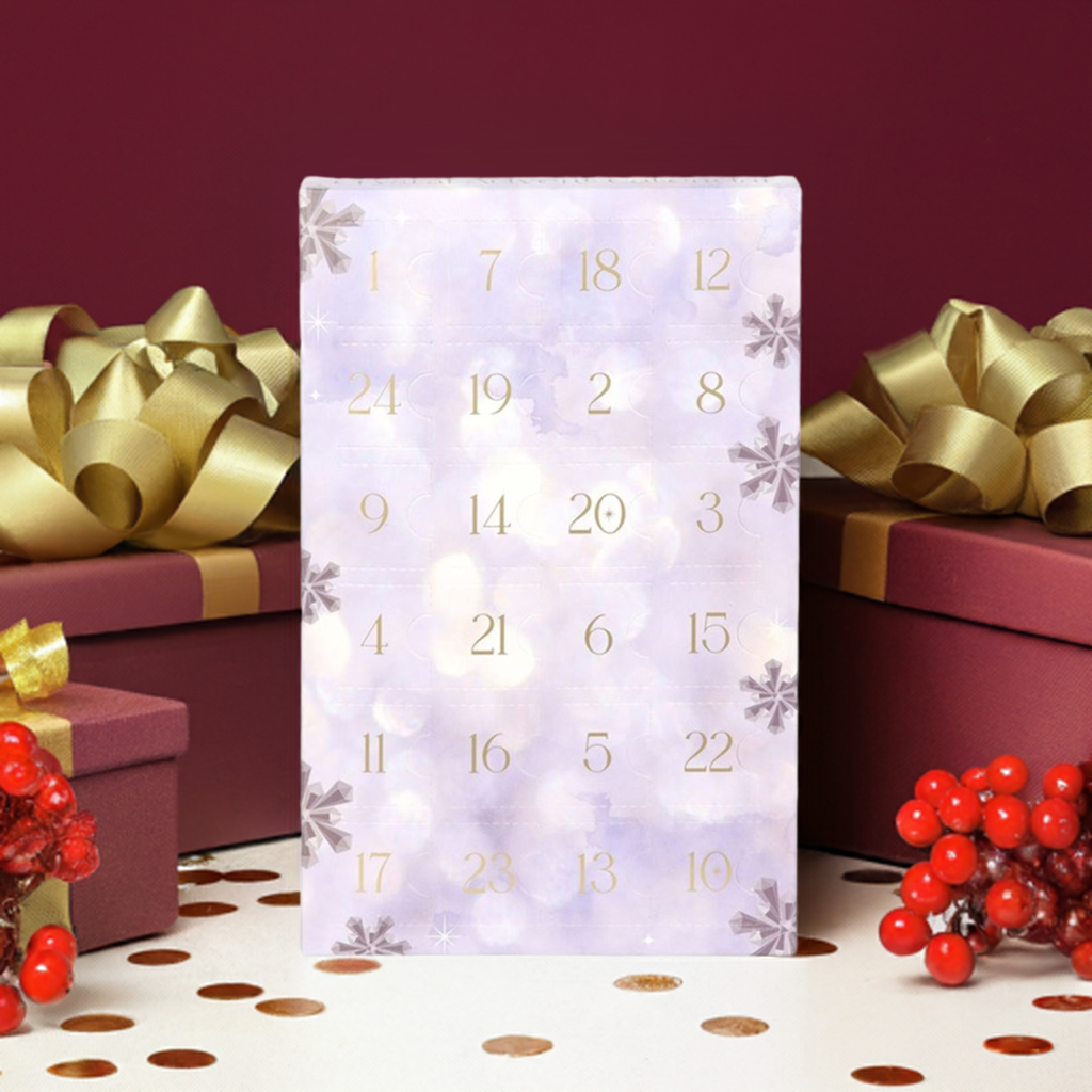 A lilac and white advent calendar box of crystals, Red presents and berries in the background