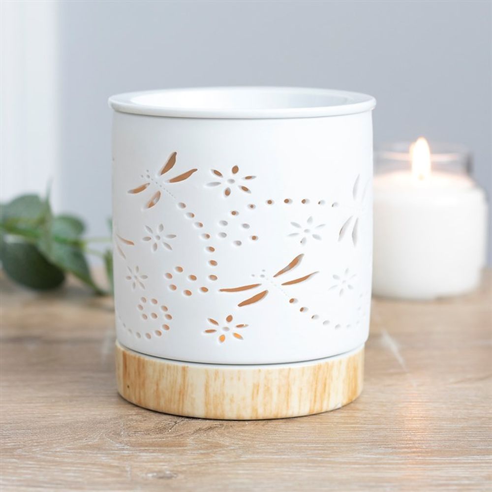 Dragonfly Matte Ceramic Oil Burner, a stylish and functional aromatherapy accessory designed for burning essential oils and wax melts. Featuring an elegant dragonfly design, this eco-friendly burner enhances relaxation, meditation, and home ambiance. Perfect for holistic healing, stress relief, and creating a calming atmosphere.