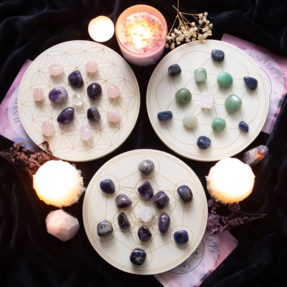 Flower of Life Crystal Grid Set, a sacred geometry-inspired kit featuring a wooden Flower of Life grid and ethically sourced crystals. Perfect for manifestation, energy amplification, and chakra alignment, this set is ideal for meditation, spiritual rituals, and holistic healing practices. Elevate your energy work with this beautifully designed crystal grid.