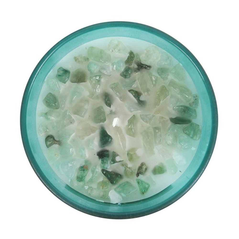 Heart Chakra Mint Crystal Chip Candle, a soothing soy wax candle infused with refreshing mint fragrance and natural crystal chips. Designed to align with the heart chakra, this candle promotes love, compassion, and emotional healing. Perfect for meditation, energy work, and creating a calming, heart-opening atmosphere in your space.