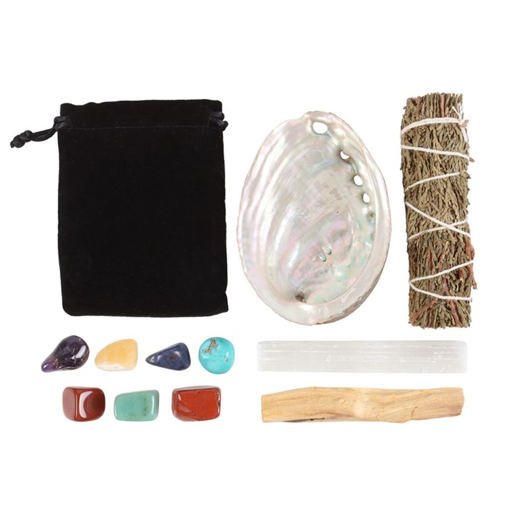 Divine Energy Smudge and Stone Wellness Kit, a holistic cleansing set featuring sustainably sourced sage smudge stick, palo santo, and healing crystals for energy purification, grounding, and spiritual balance. Perfect for meditation, chakra alignment, and clearing negative energy. Elevate your self-care rituals with this thoughtfully curated wellness kit.