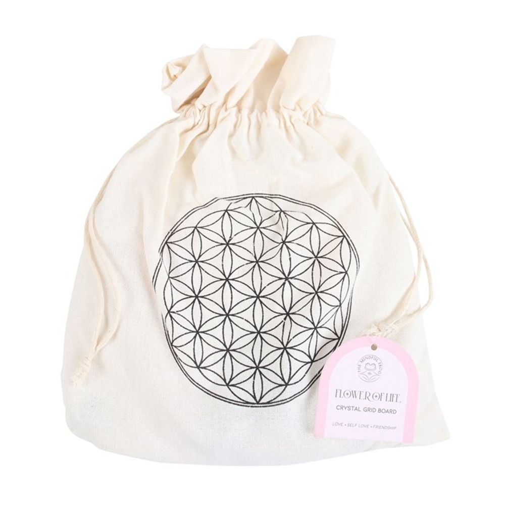Flower of Life Crystal Grid Set, a sacred geometry-inspired kit featuring a wooden Flower of Life grid and ethically sourced crystals. Perfect for manifestation, energy amplification, and chakra alignment, this set is ideal for meditation, spiritual rituals, and holistic healing practices. Elevate your energy work with this beautifully designed crystal grid.