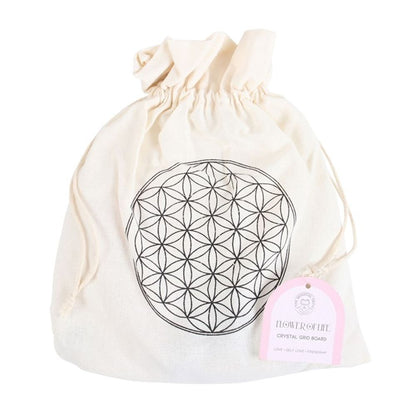 Flower of Life Crystal Grid Set, a sacred geometry-inspired kit featuring a wooden Flower of Life grid and ethically sourced crystals. Perfect for manifestation, energy amplification, and chakra alignment, this set is ideal for meditation, spiritual rituals, and holistic healing practices. Elevate your energy work with this beautifully designed crystal grid.