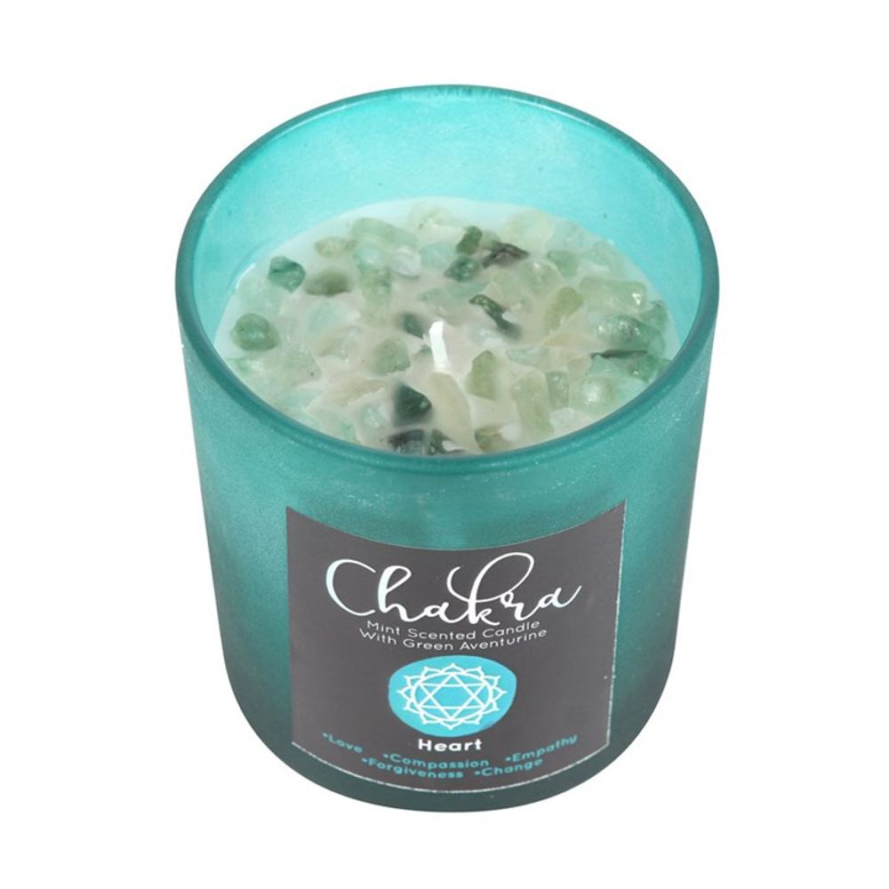 Heart Chakra Mint Crystal Chip Candle, a soothing soy wax candle infused with refreshing mint fragrance and natural crystal chips. Designed to align with the heart chakra, this candle promotes love, compassion, and emotional healing. Perfect for meditation, energy work, and creating a calming, heart-opening atmosphere in your space.